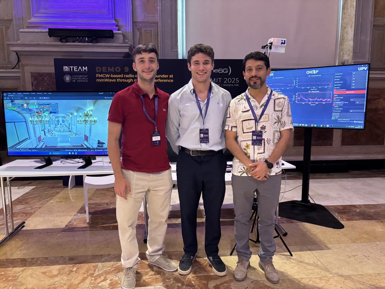 The CHIRP team at the one6G Summit 2025 demonstration booth in Bologna, with screens showing live channel measurements and an FMCW sensor on a stand